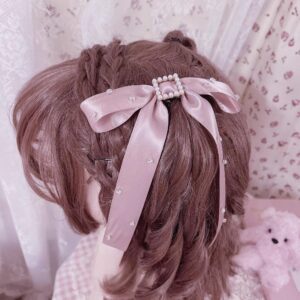Pink satin bow hair clip with pearl-rimmed square rhinestone buckle center piece displayed on mannequin, showcasing delicate Jirai Kei aesthetic hair accessory with flowing ribbon straps