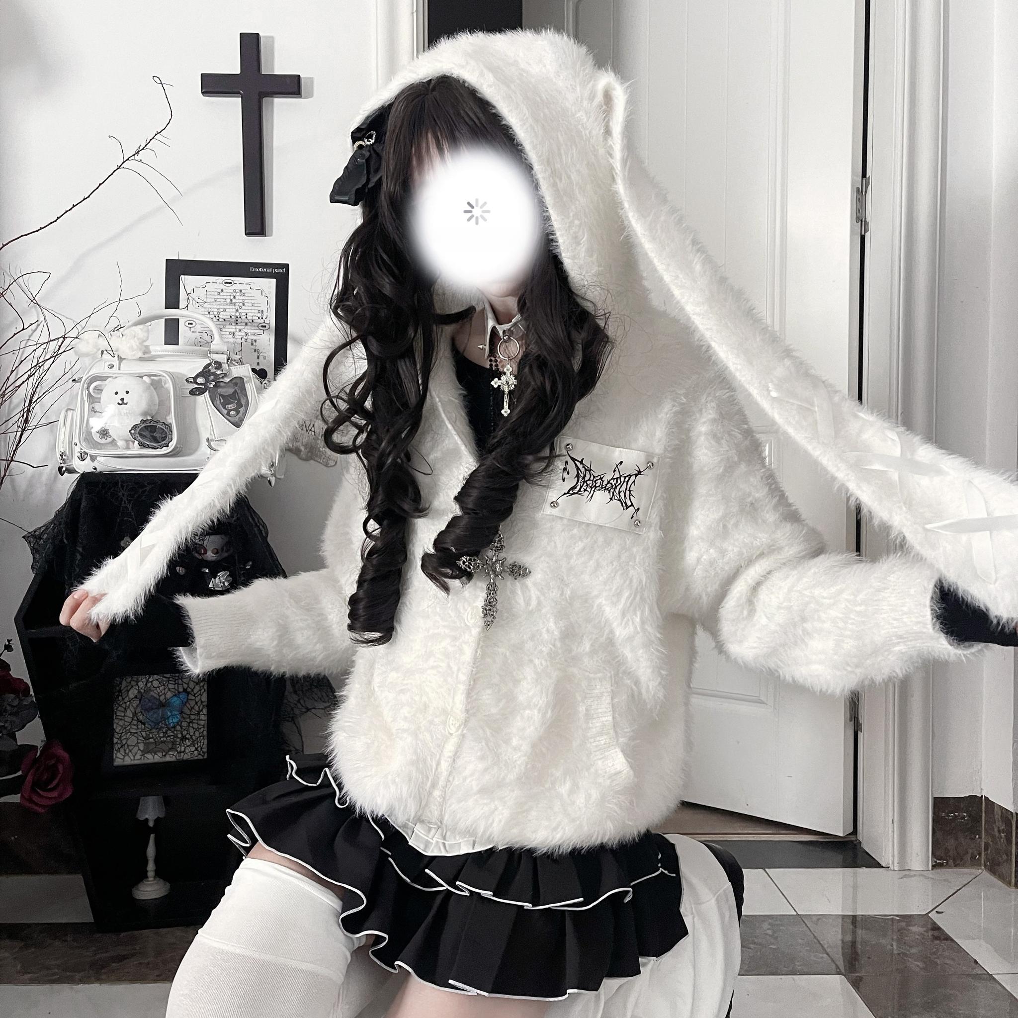 white soft faux mink jirai kei bunny ear hooded coat front half-body model shot gothic aesthetic
