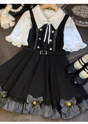Jirai Kei preppy school uniform flat lay overhead shot featuring white ruffled blouse and black suspender skirt with striped ruffle hem, styled with matching shoes and plush toy accessories