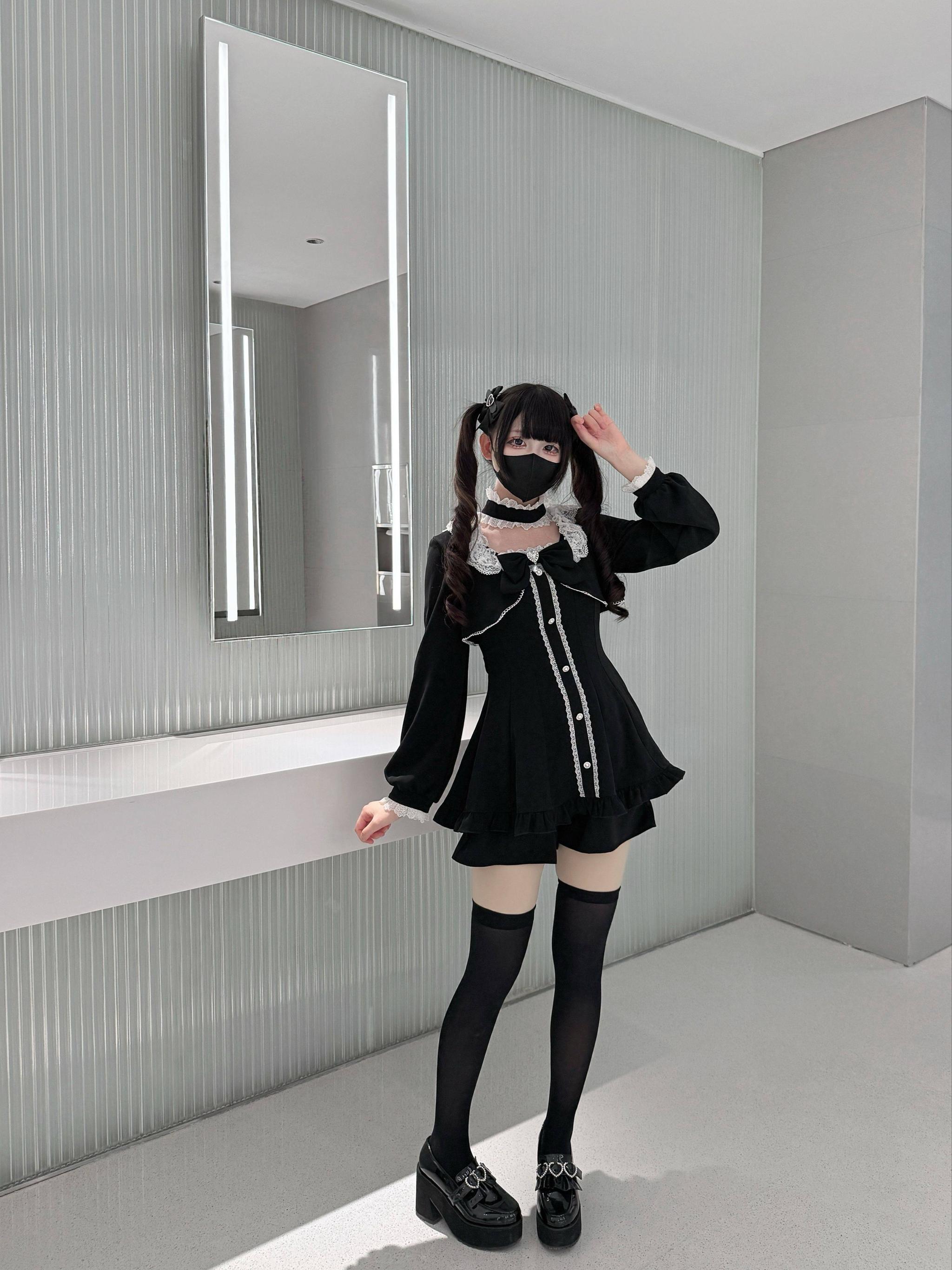 Gray Jirai Kei long-sleeve dress and pocketed shorts ensemble highlighting the complete look with all accessories included