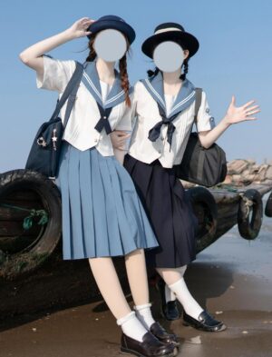 Ocean blue Jirai Kei sailor uniform set front group shot two color skirt variants matching accessories coastal beach