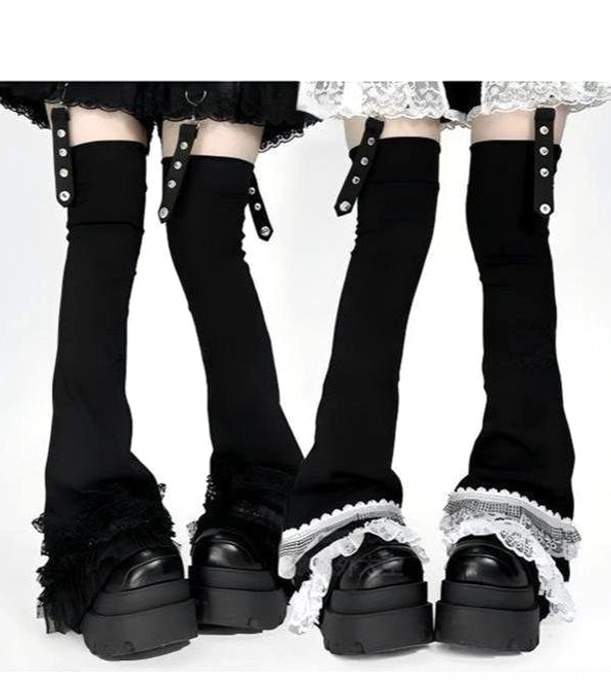 Flared over-the-knee leg warmers with white lace ruffle cuffs, adjustable buckle straps and platform boots from low front view