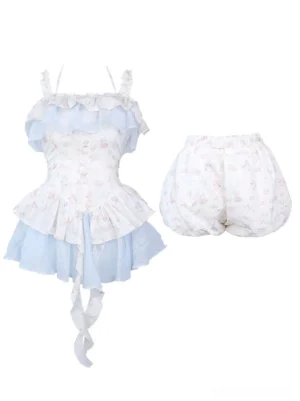 Flat lay product display of floral print dress and ruffled bloomers showing two-tone blue white design with layered hem details