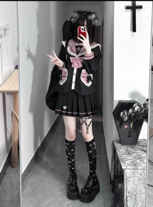 Jirai Kei sailor uniform rear three-quarter mirror selfie showing back details, black backpack styling, and platform loafers with patterned socks