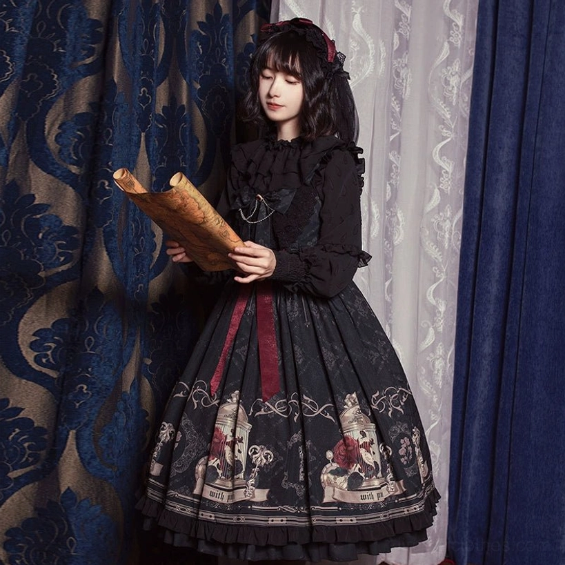 Black long sleeve gothic lolita dress side standing pose vintage scroll prop red waist sash