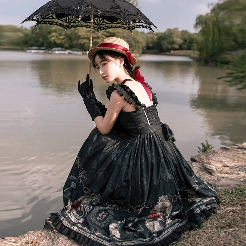 Black gothic lolita jsk dress close up birdcage print metallic details hem ruffle design