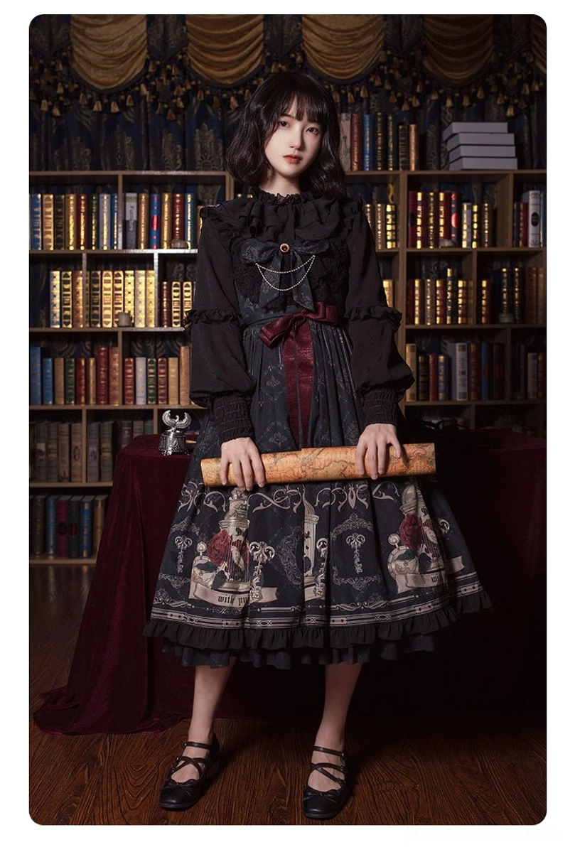 Gothic lolita jsk dress black with birdcage metallic print front pose vintage indoor