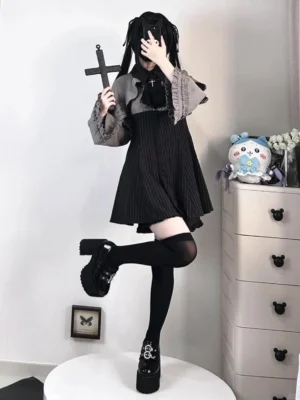 Black gothic princess ruffle jirai kei two-piece dress shorts set front view full body standing pose twin tail hairstyle
