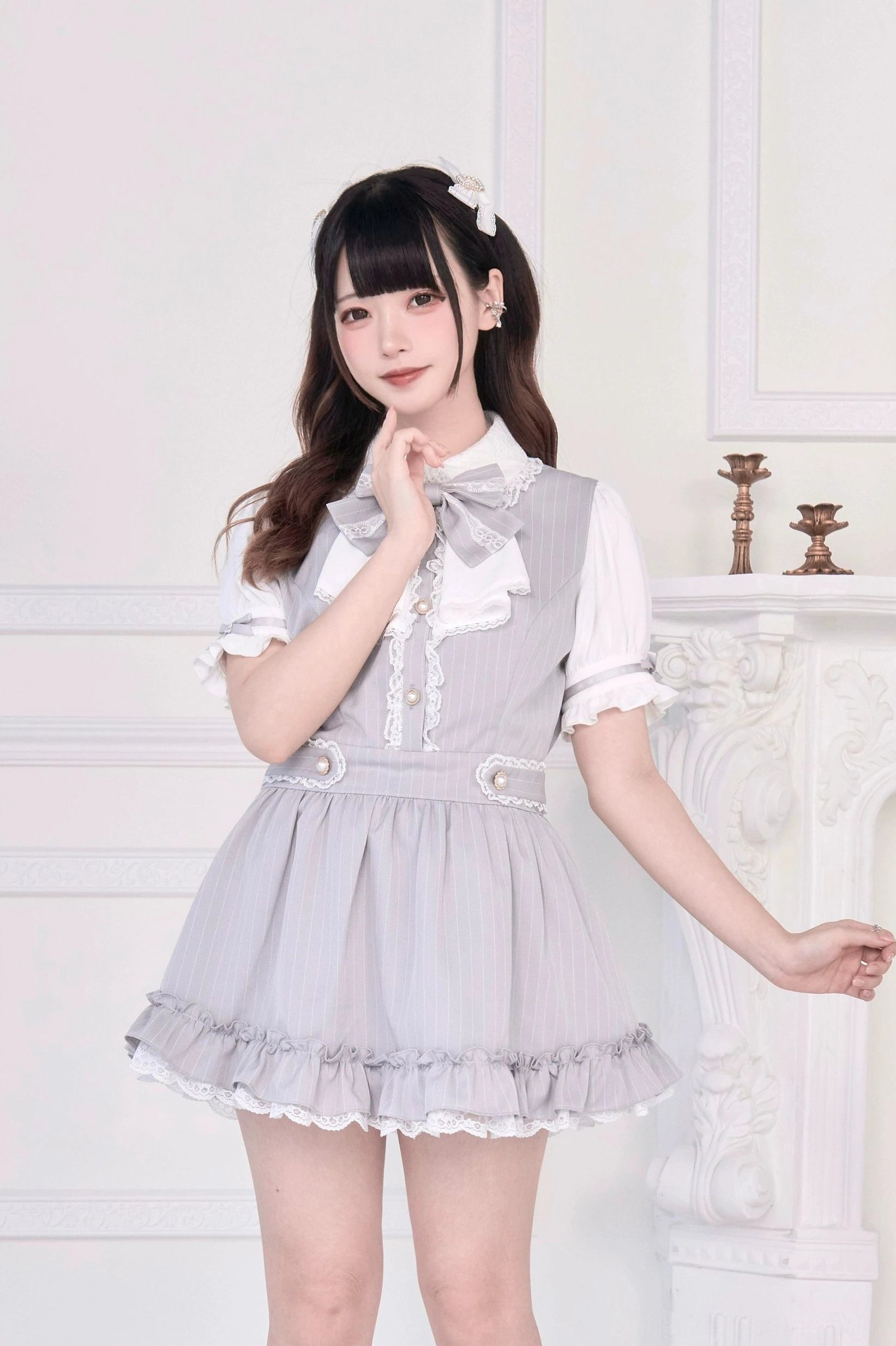 Gray Jirai Kei maid dress close-up half-body view model bow collar short overlay sleeves ruffled skirt