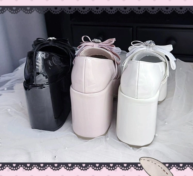 Gray-pink Ryousangata Jirai Kei platform loafers demonstrating soft colorway aesthetic with heart buckle strap and satin bow