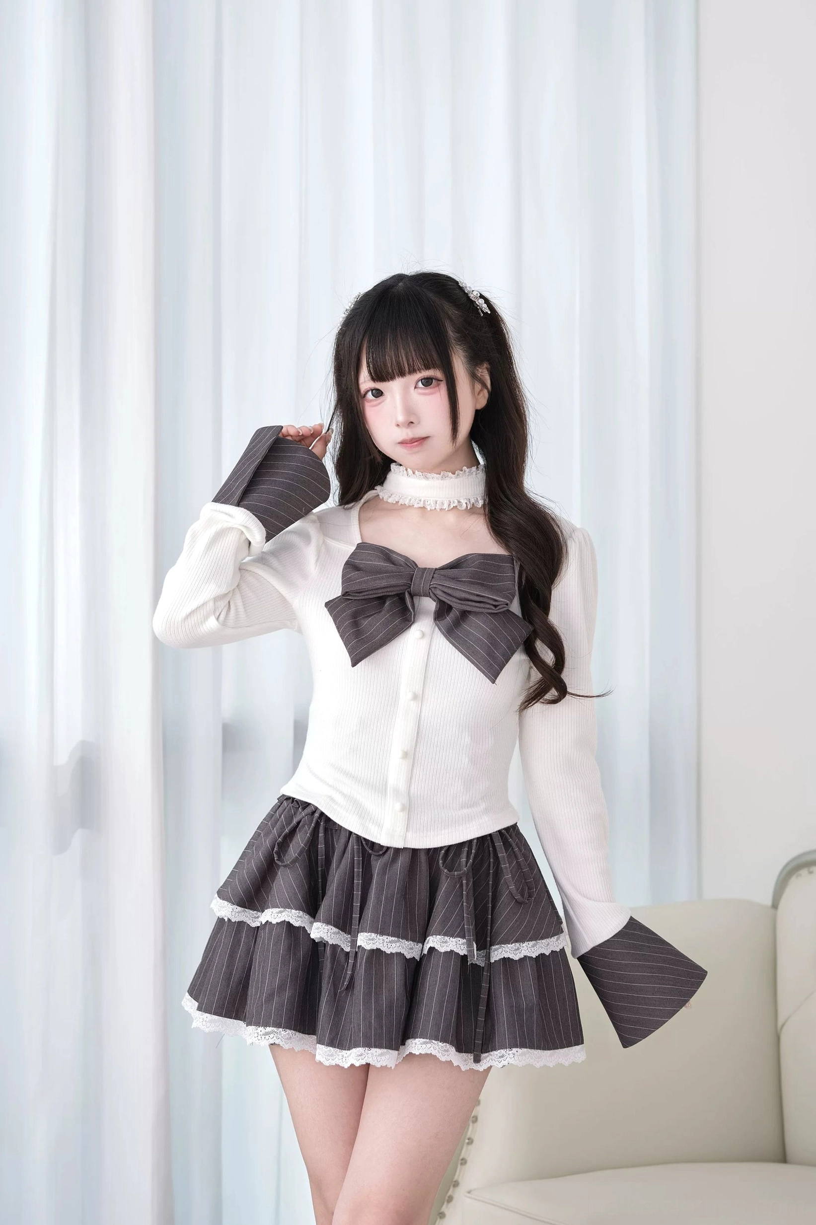 Gray striped Jirai Kei ruffled choker knit top with flared cuffs and plaid bow front full body view