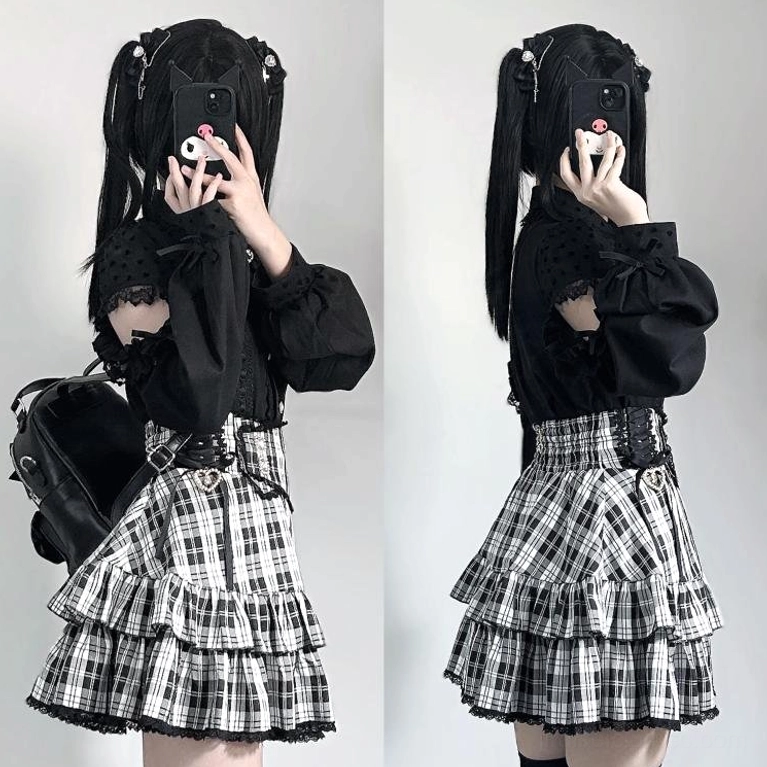 Gray-white plaid tiered Jirai Kei mini skirt with white off-shoulder top, black stockings and platform boots, full-body mirror selfie showing elegant styling