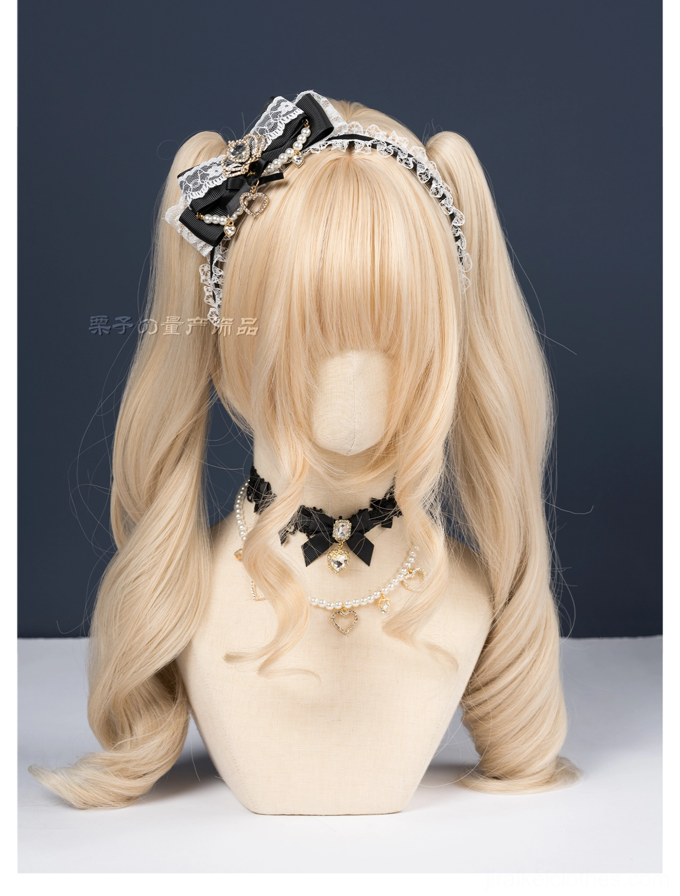 Grayish blue ryousangata plush bow headband close-up detail rhinestone embellishment dark backdrop