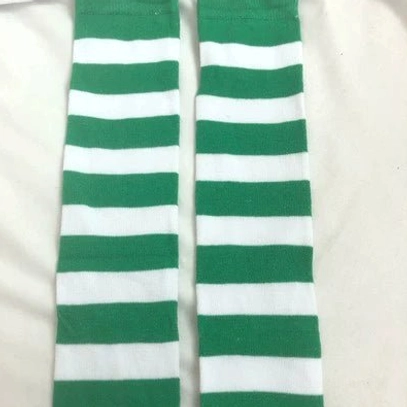 Greenish white striped over-the-knee socks flat lay top view, unique colorway alternating horizontal stripes
