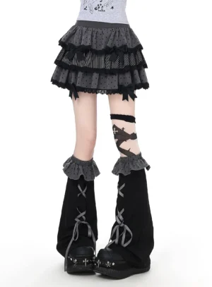 Grey and black Jirai Kei subculture tiered skirt with ruffled leg warmers, featuring lace trim and asymmetrical design, front studio shot