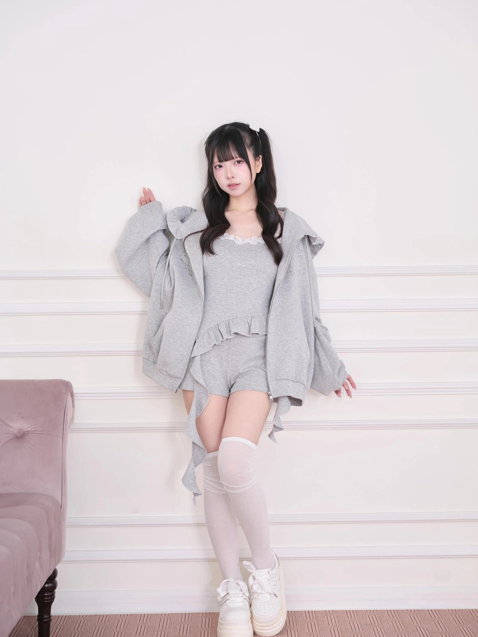 Grey oversized hoodie jacket with loose fit paired with grey lounge shorts - Jirai Kei relaxed streetwear full body shot