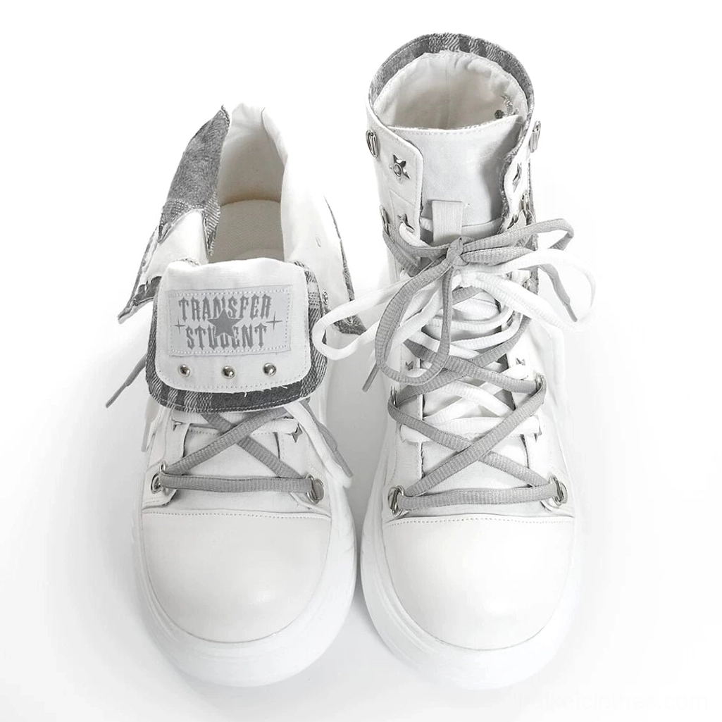 Front product shot of grey-white platform high-top canvas sneaker with foldable collar showing grey dual-tone laces and canvas upper material detail