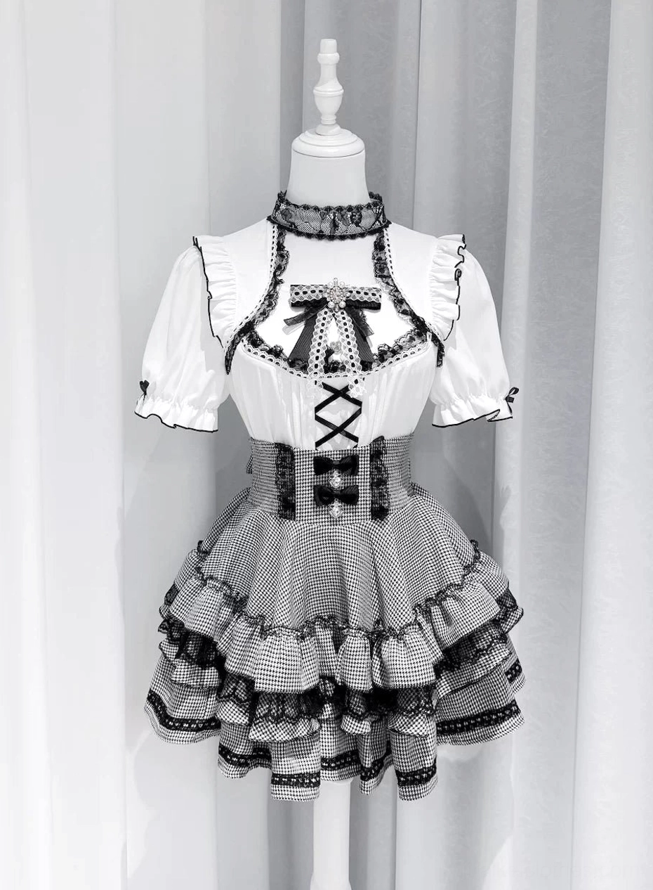 White heart lace collar Jirai Kei blouse with gingham tiered skirt displayed on dress form flat lay