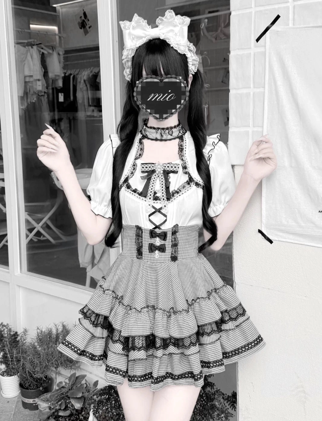 Houndstooth pattern Jirai Kei tiered ruffle skirt detail view showcasing layered construction and pattern design
