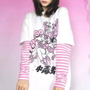 Half-body close-up of pink-white striped false two-piece anime graphic long sleeve tee shirt jirai kei style with chinese text print