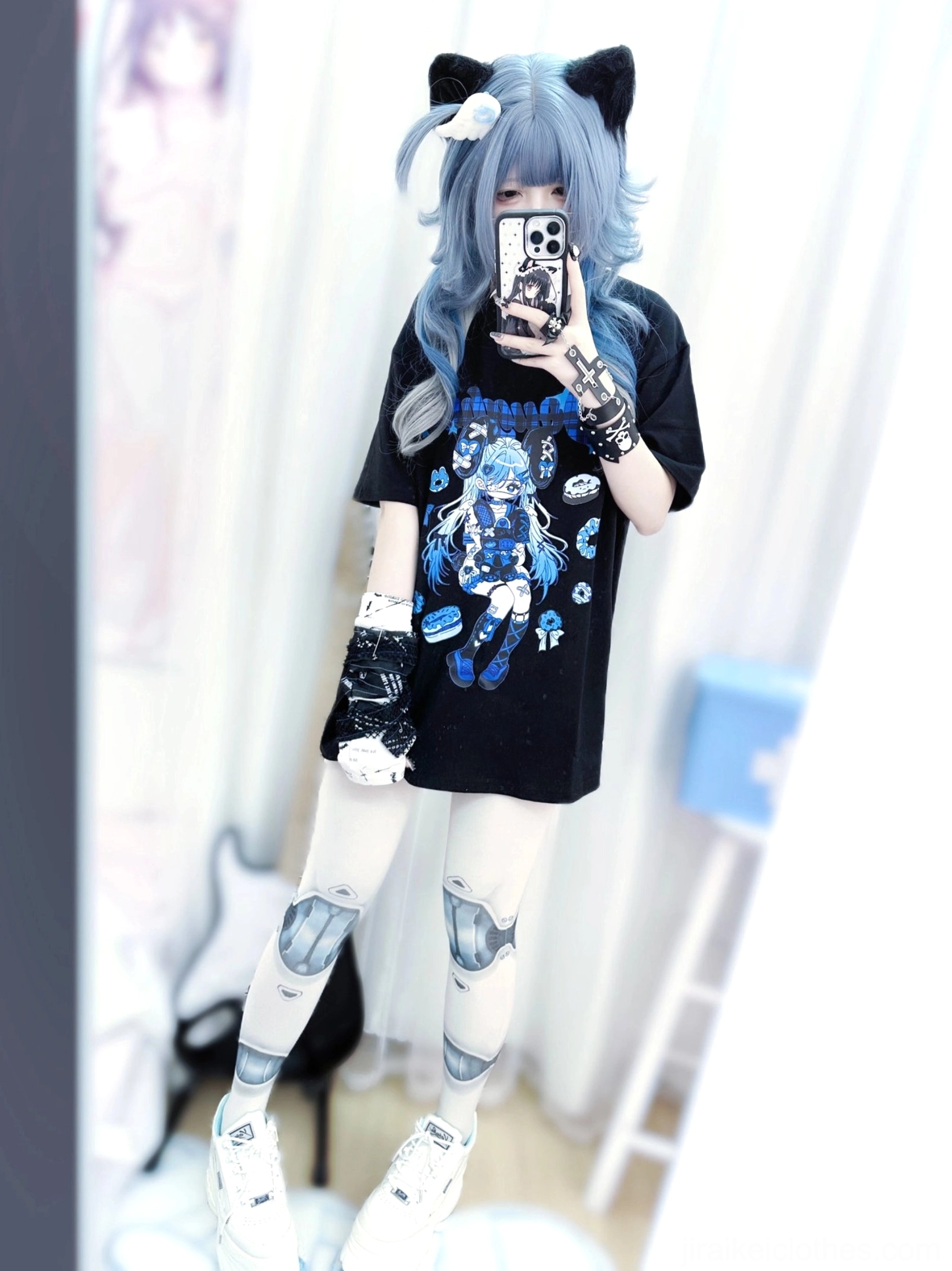 Full-body mirror selfie of Jirai Kei anime punk T-shirt styled with white prosthetic-decor tights and white sneakers, complete Jirai Kei aesthetic outfit coordination