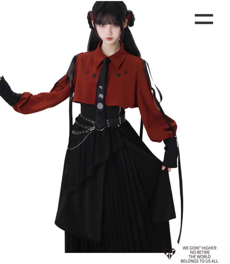 Three-quarter side perspective of Jirai Kei ensemble featuring asymmetrical black skirt construction, waist chain decorative elements, and gothic architectural silhouette