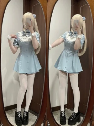 Baby blue Jirai Kei lace dress set with bow tie on ruffled collar and puff short sleeves worn with white thigh-high stockings