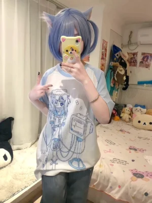 Blue-white oversized Jirai Kei graphic t-shirt with bandaged angel ECG medical print, worn by model with blue cat ear wig, front mirror selfie bedroom view