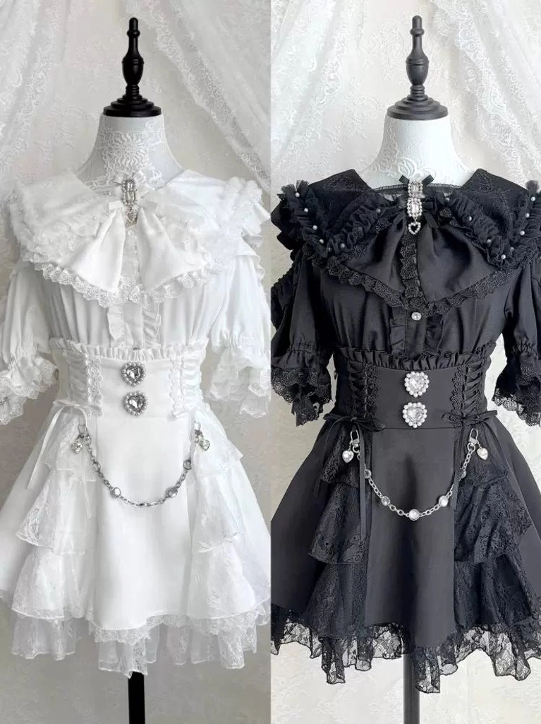 Black Jirai Kei blouse front close-up of heart brooch and pearl decorations on lace