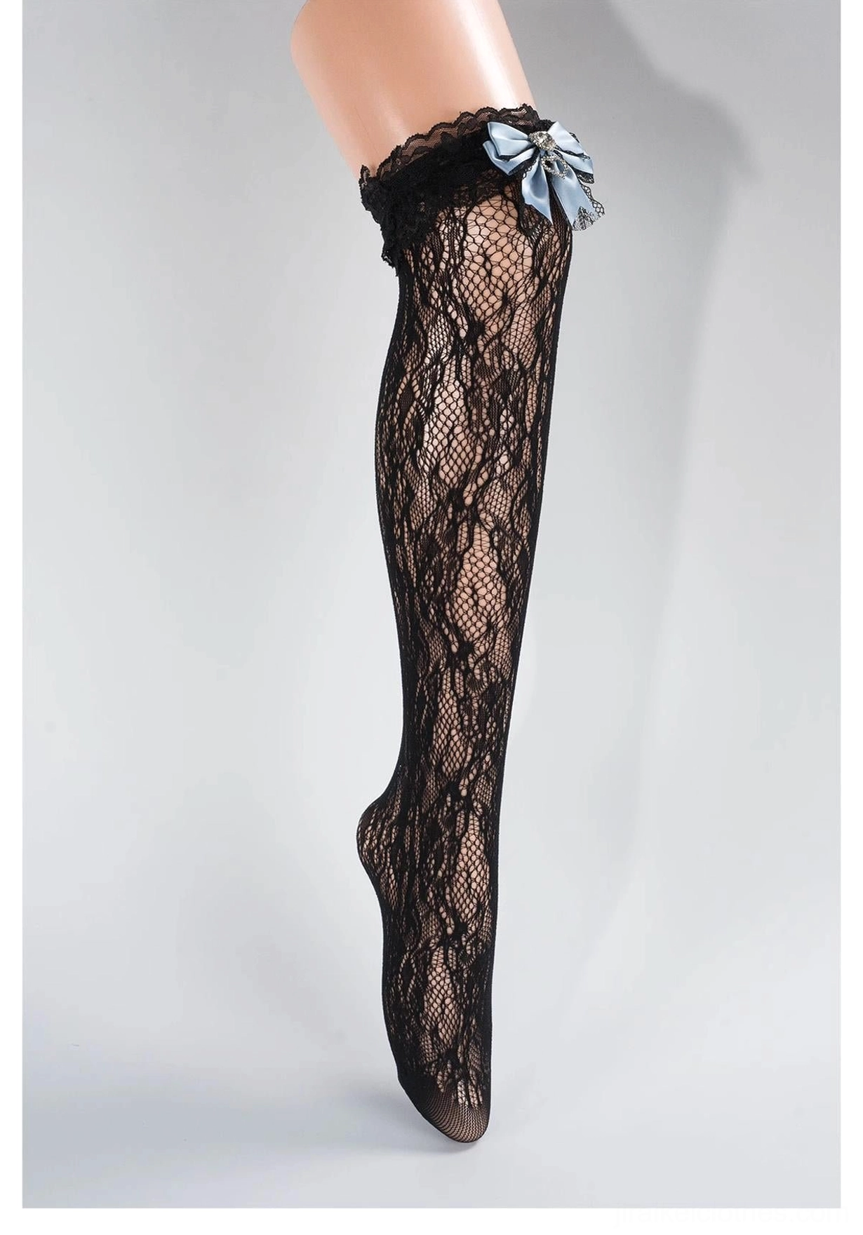 Black lace mid-calf Jirai Kei socks with blue bow decoration and heart rhinestone embellishment, delicate ruffled lace cuff detail