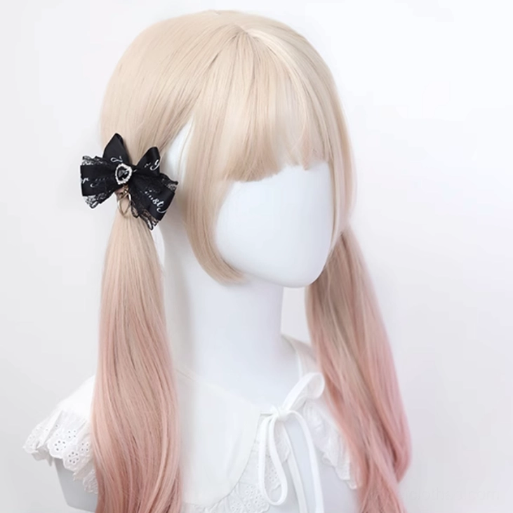 Black satin bow Jirai Kei hair clip featuring long printed lace ribbon and heart crystal decoration, modeled on ombre twin-tail wig mannequin