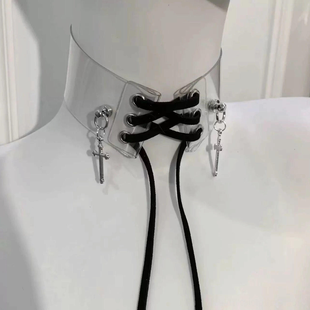 Black Jirai Kei transparent choker necklace with adjustable lace straps and silver cross pendants, front mannequin display