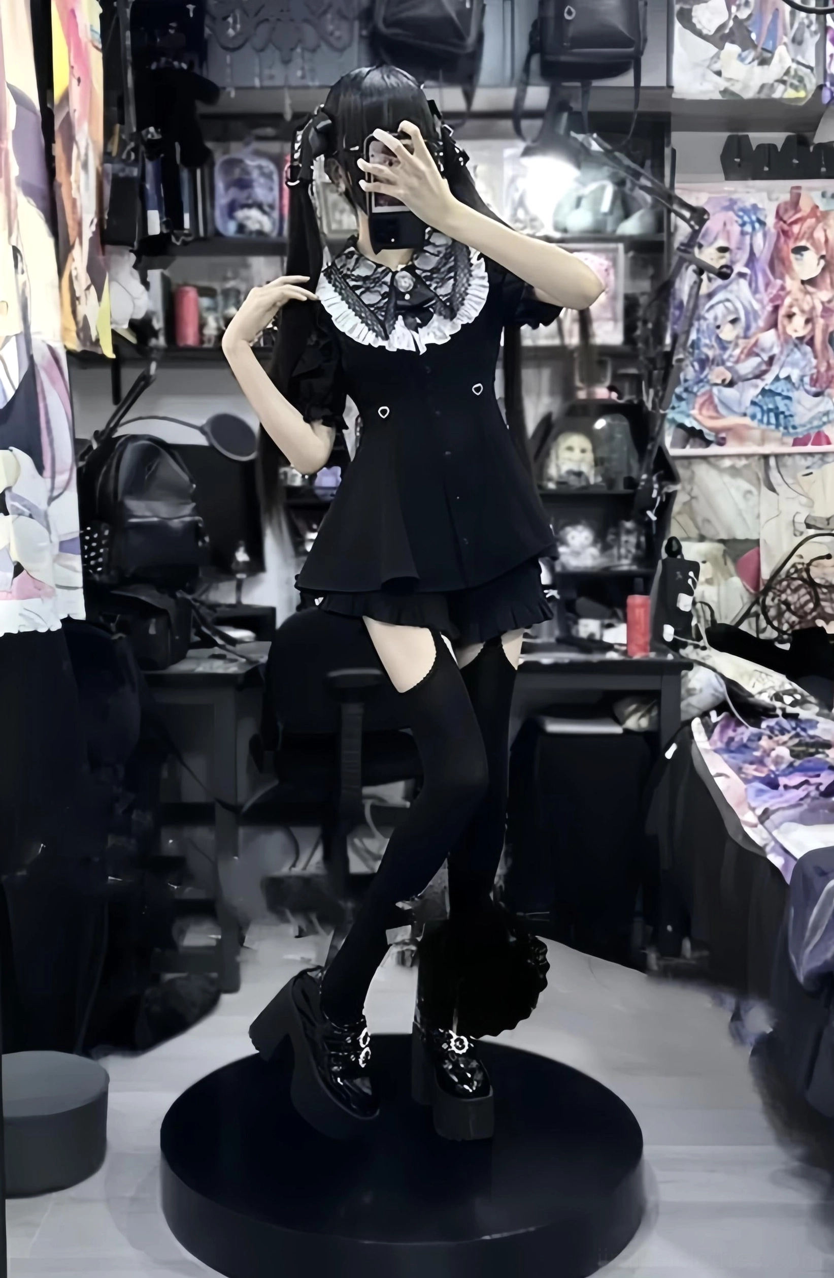 Black Jirai Kei dress set mirror selfie full-body view with ruffled hem, black thigh-high socks and platform boots in anime-themed home studio