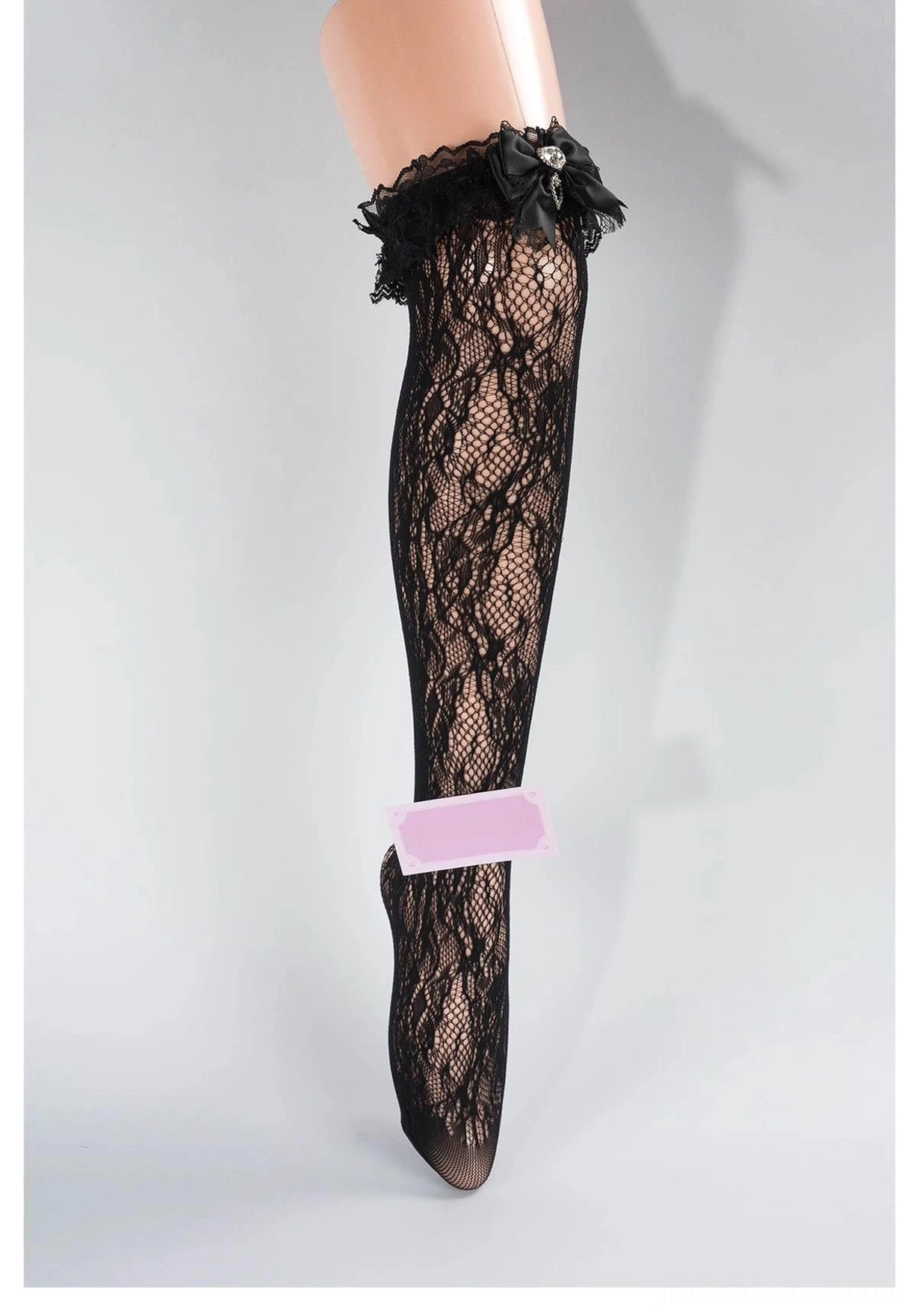 Classic black floral lace mid-calf Jirai Kei socks with ruffled black lace cuff, solid lace texture detail, front partial close-up