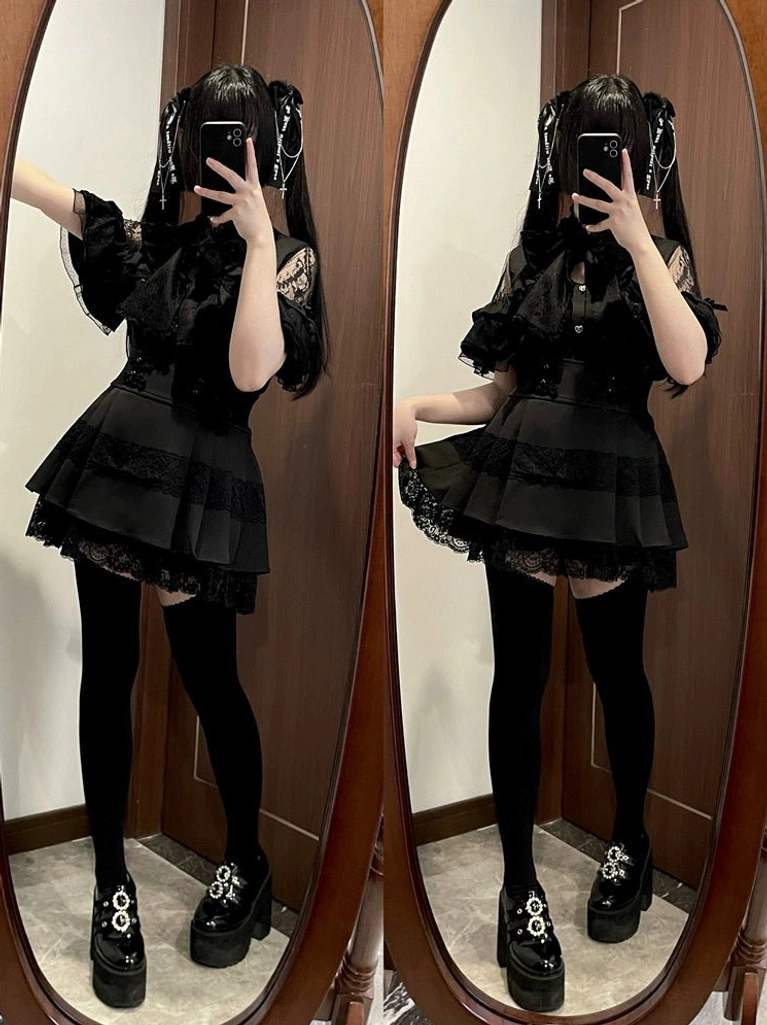 Black jirai kei lace blouse with bow collar front view styling dark moody aesthetic off-shoulder design showcase
