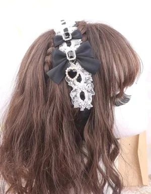 Black Jirai Kei lace heart rhinestone headband with gothic elegance, rear view on mannequin showing detailed lace trim and heart-shaped rhinestone decorations