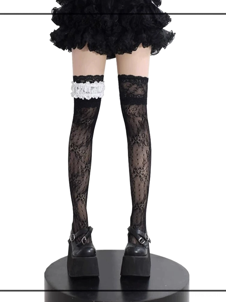 Black floral lace Jirai Kei thigh-high stockings with ruffled garter front view, paired with black platform Mary Jane shoes and ruffled skirt