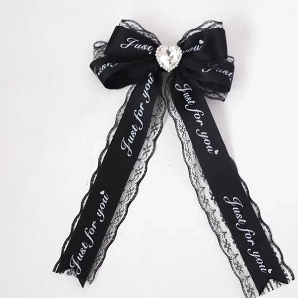 Black letter long ribbon Jirai Kei hair clip with extended printed ribbon design and crystal heart decoration, statement hair accessory
