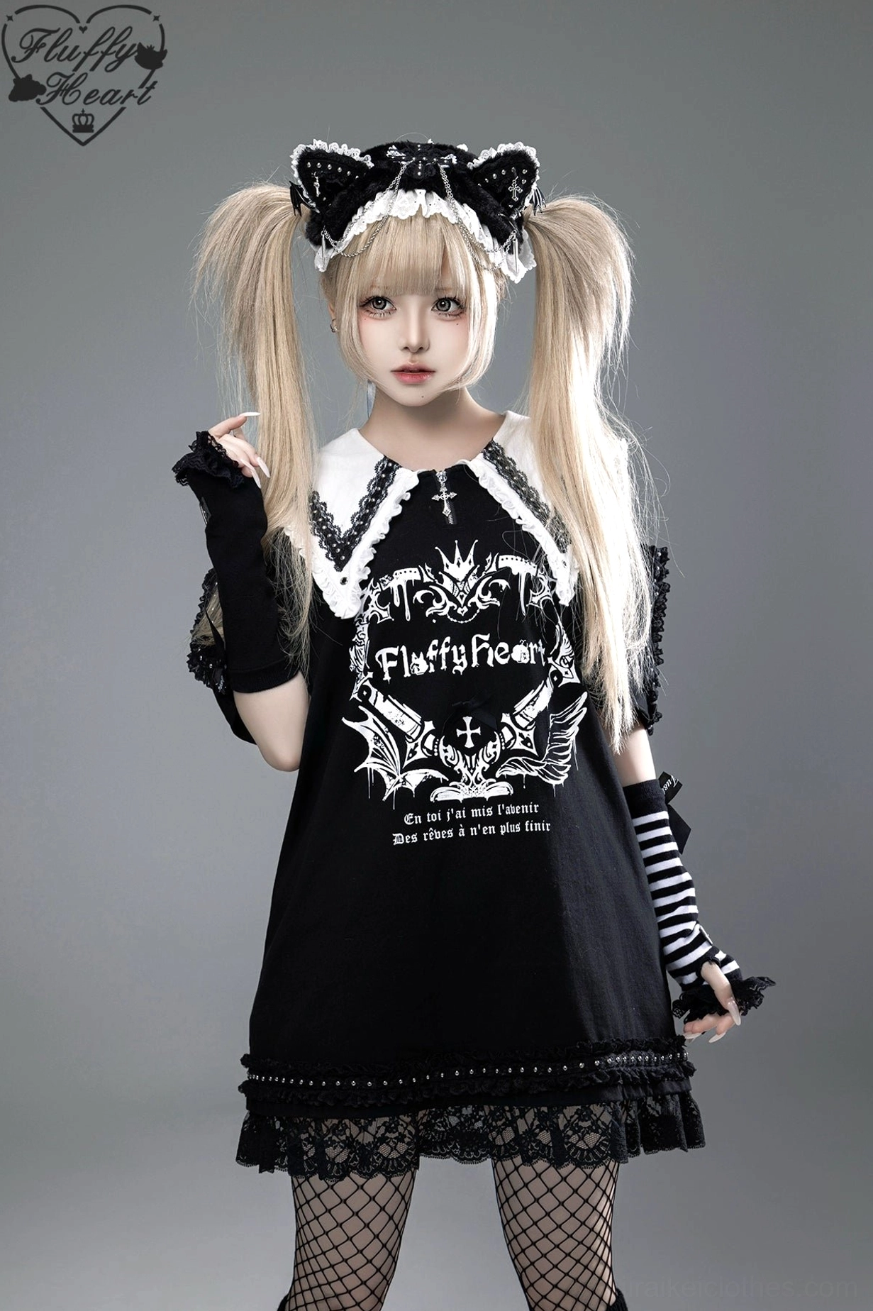 Jirai Kei maid aesthetic T-shirt dress in black with white lace peter pan collar, gothic graphic print, and fishnet stockings on blonde twin tails model