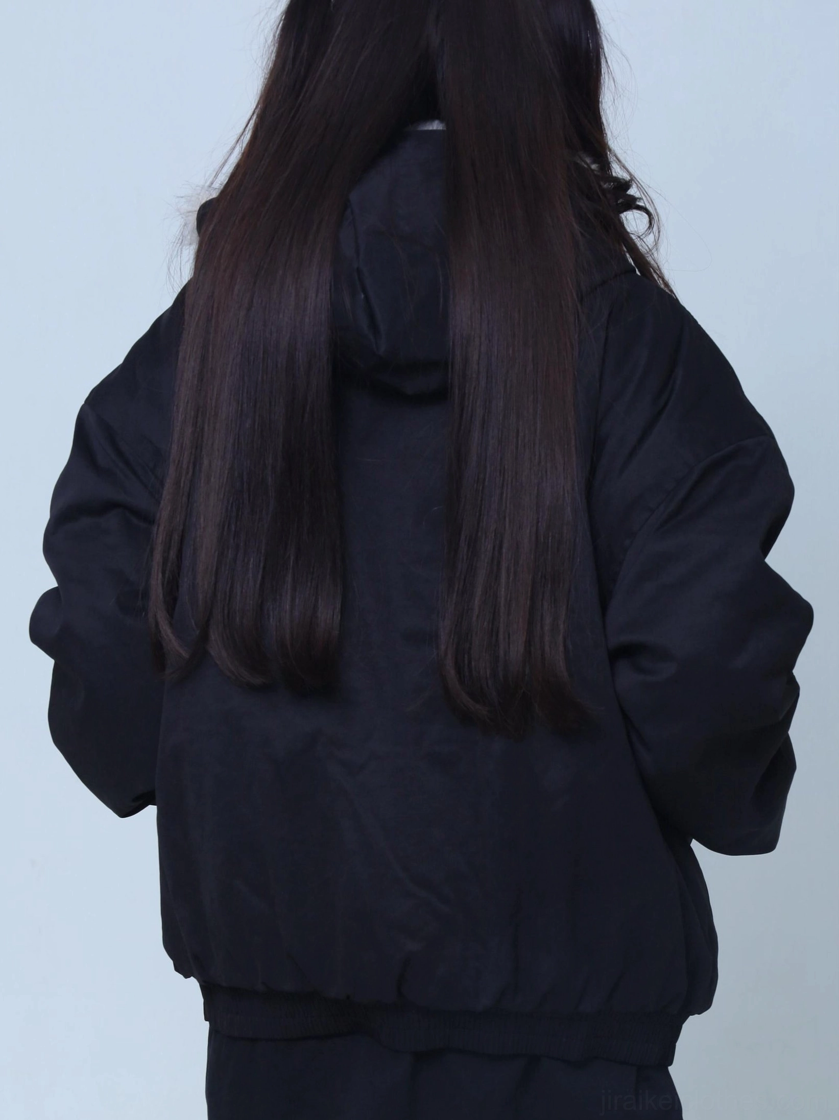 Black oversized Jirai Kei padded jacket back view solid exterior quilted lining relaxed silhouette gothic fashion