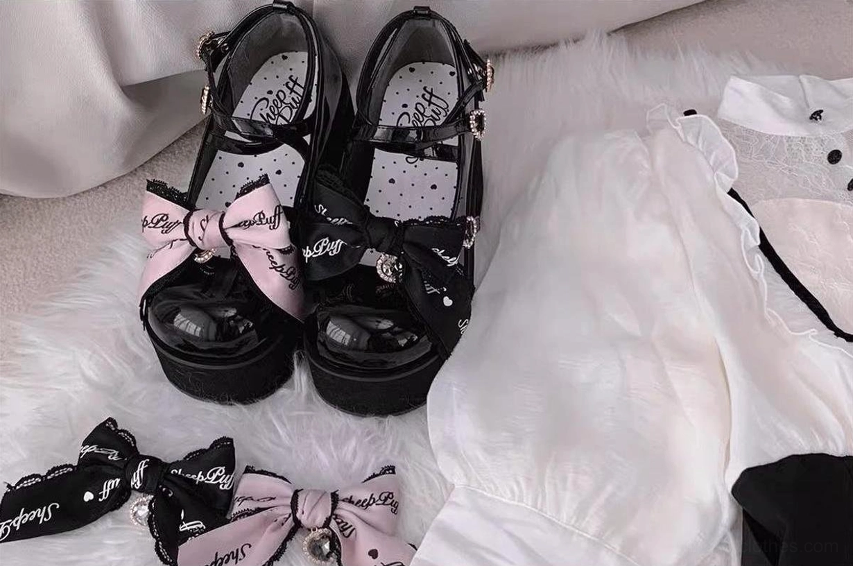 Detailed product photography of black platform Mary Jane Jirai Kei shoes highlighting PU patent leather quality, buckle hardware craftsmanship, and overall construction