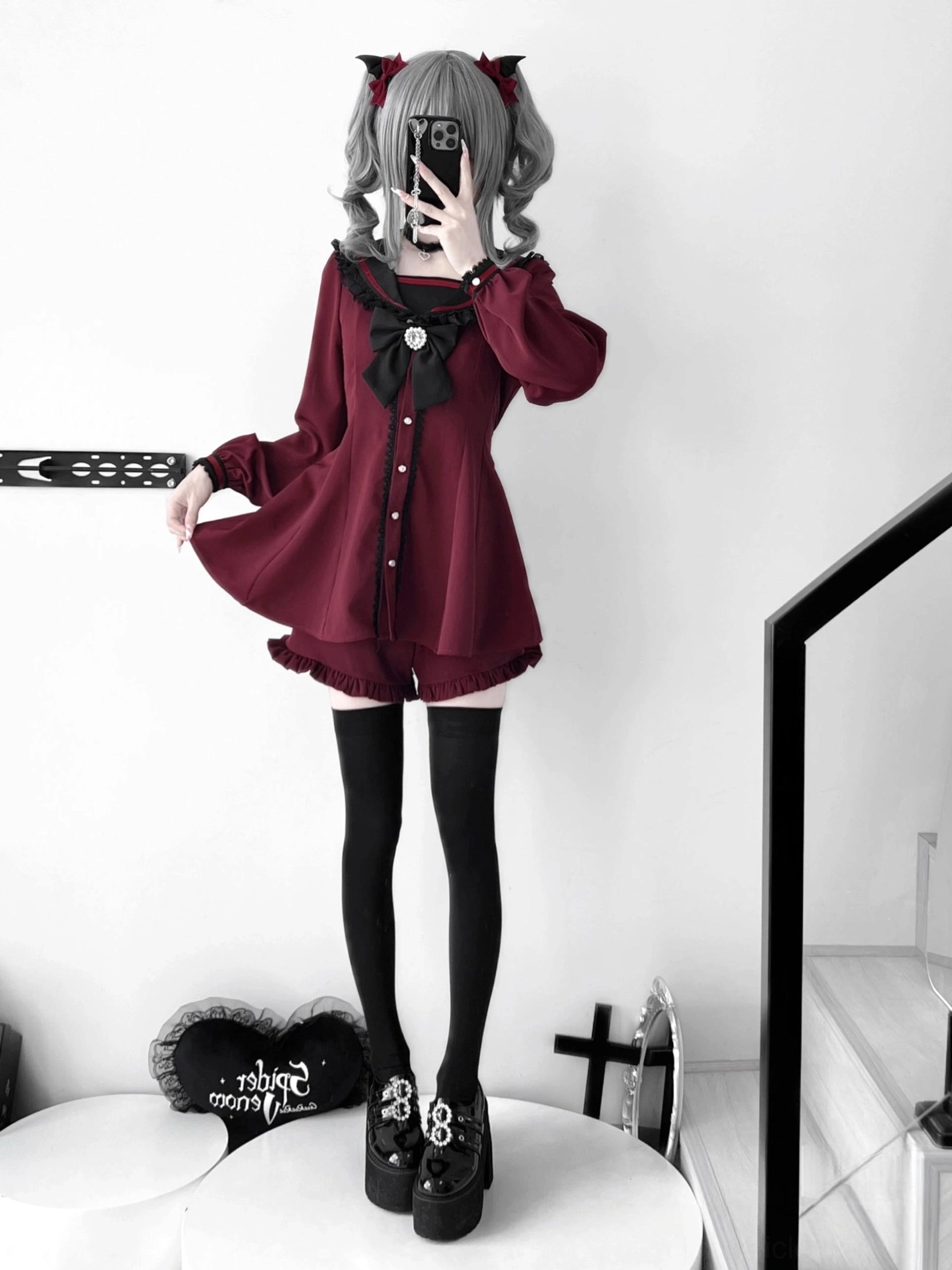 Jirai Kei black and red wine sailor collar dress with bunny ears, full-body standing view, ruffled shorts matching set