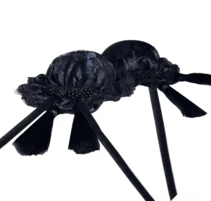 Black matte satin Chinese-style hair clips with velvet ribbons and traditional knot embellishments, overhead product display, Jirai Kei hair accessory styling option