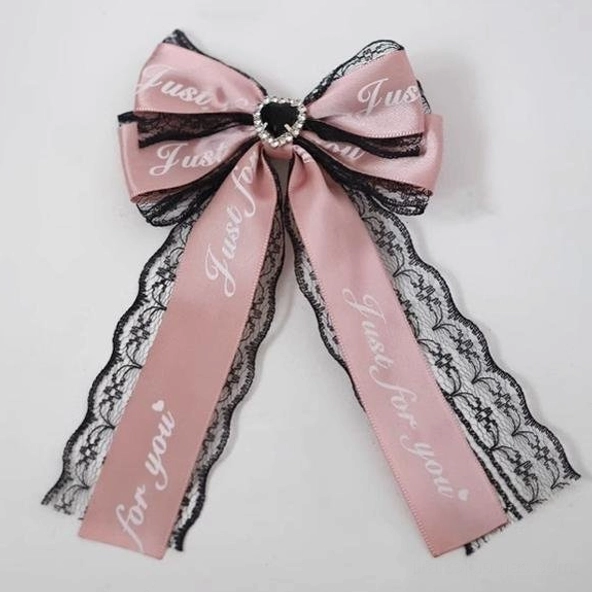 Black short ribbon Jirai Kei hair clip with compact bow silhouette, perfect for half-up hairstyles and layering with multiple clips