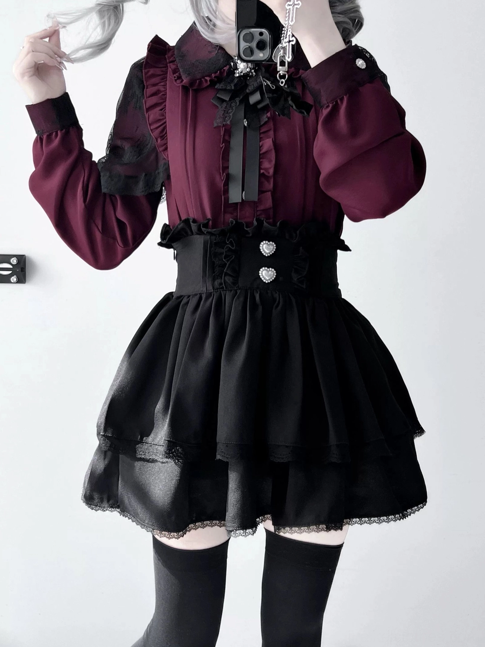 Jirai Kei black tiered ruffle skirt with lace trim heart-shaped buttons detail front view