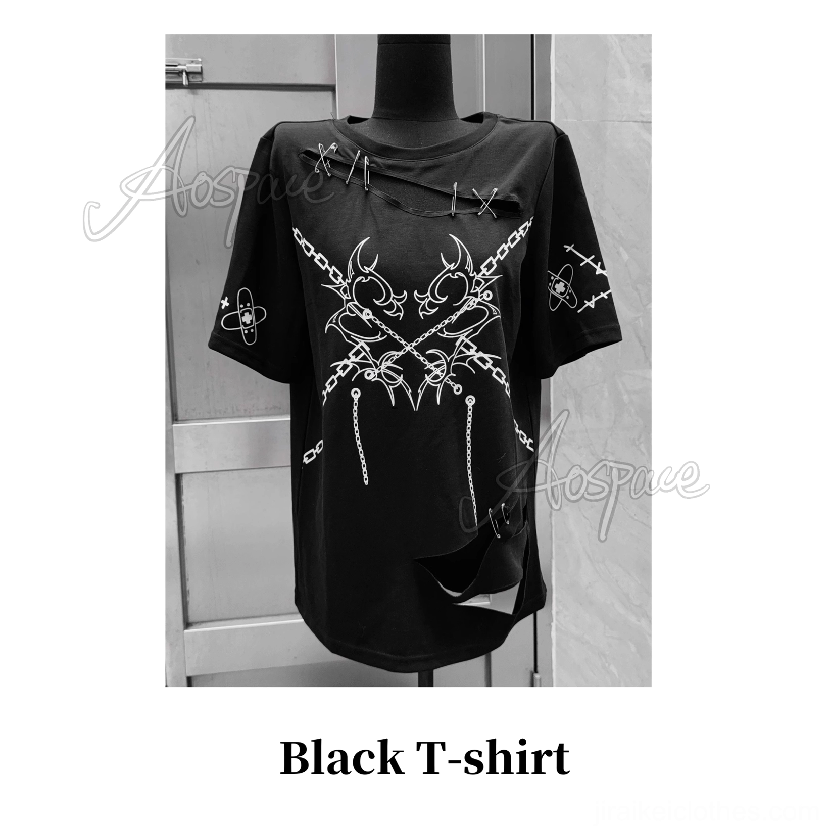 Two models in mirror selfie wearing matching black jirai kei oversized t-shirts with bondage strap print and bloodied bandage graphic details