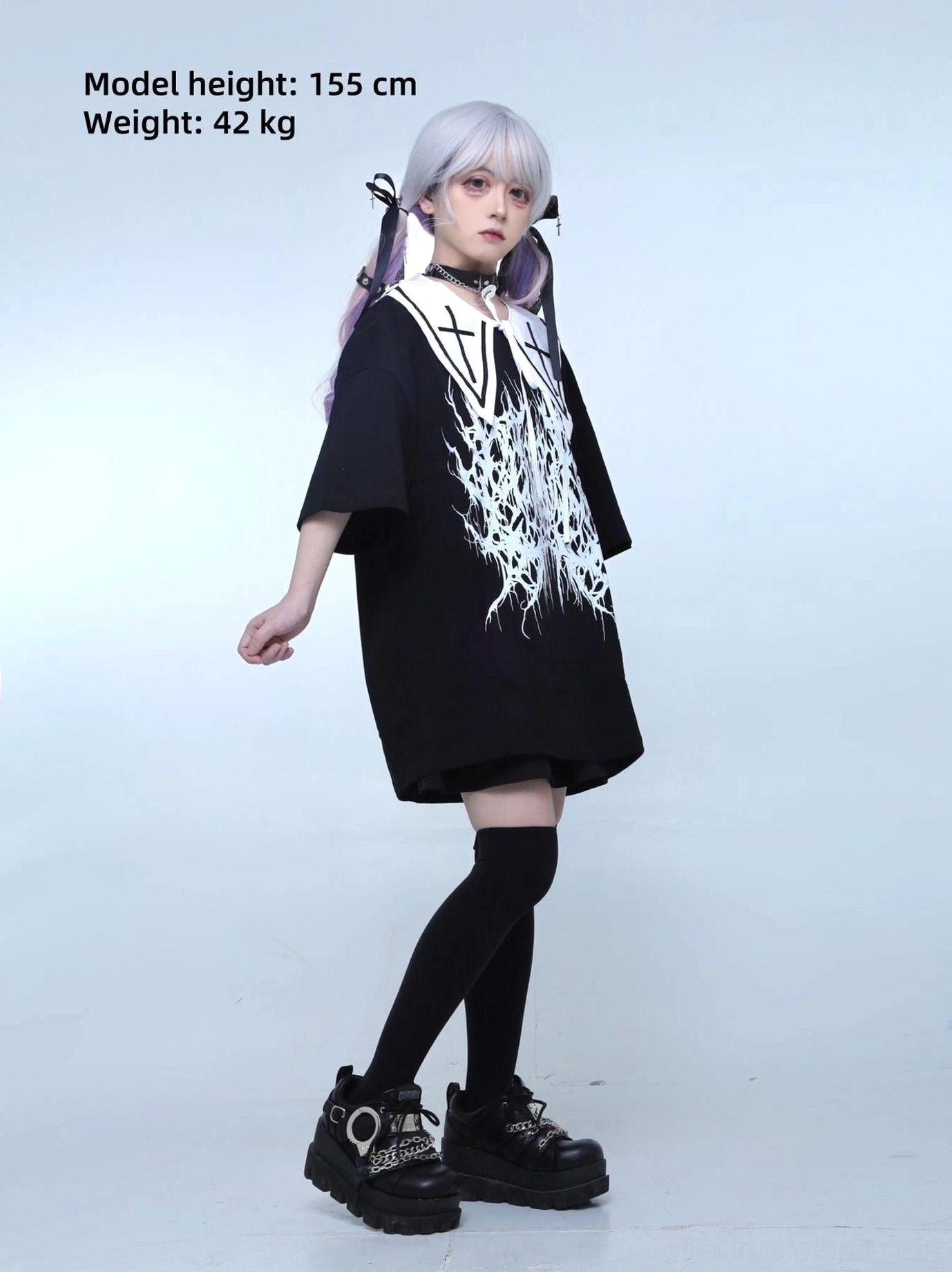Gothic Jirai Kei oversized black t-shirt with tieable white sailor collar cross designs side three-quarter view platform boots choker