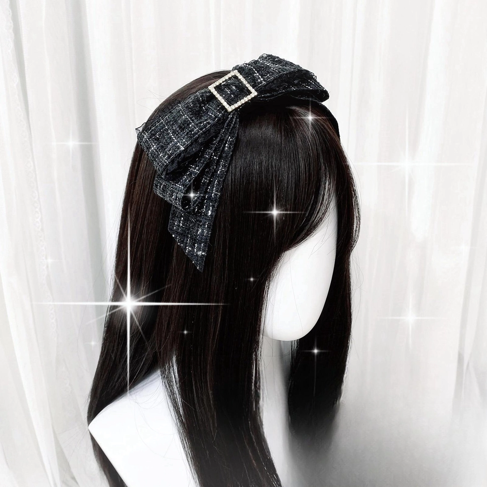 Black Jirai Kei double-layered bow headband with square rhinestone accents on mannequin side view