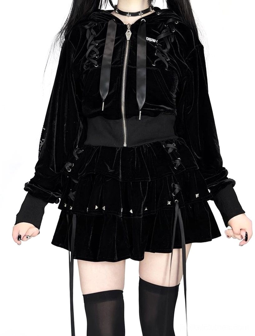 Black velvet Jirai Kei cropped hoodie with ribbon drawstring and layered rivet skirt full-body front view on model with twin tails