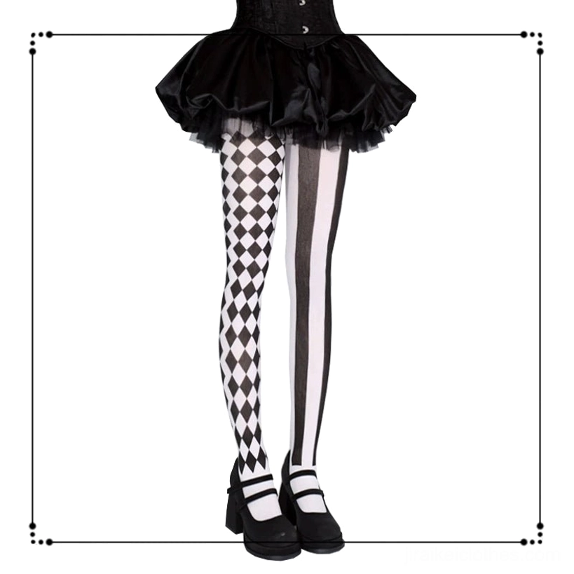 Black and white asymmetric argyle and stripe Jirai Kei pantyhose front full lower-body view with black tutu skirt and Mary Jane shoes goth aesthetic